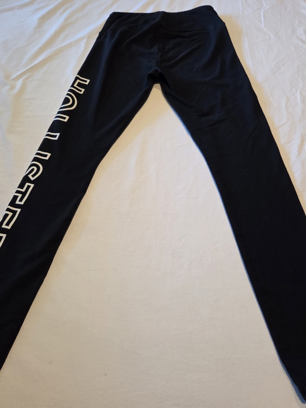 Hollister Women's Black Graphic Side-Leggings with White Lettering